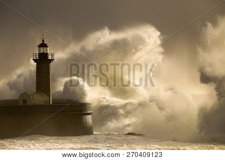 Big Storm With Big Waves Near A Lighthouse