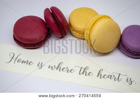 Macaroon Close-up With Decorative Ribbon Isolated On Light Background.