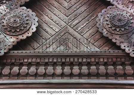 Fragment Of Wooden Carving On A Traditional Russian House (terem). Wood Carved Ornament.
