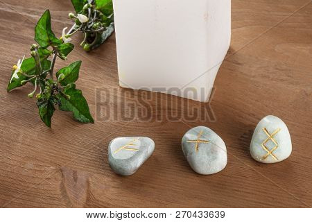 A Closeup Photo Of Norse Runes, Stones With Symbols Used In Wicca And Other Magic And For Divination