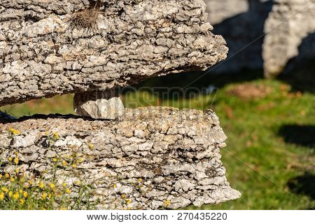 Two Limestone Rocks (karst Erosion) With A Pebble In The Regional Natural Park Of Lessinia (valle De