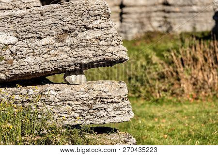 Two Limestone Rocks (karst Erosion) With A Pebble In The Regional Natural Park Of Lessinia (valle De