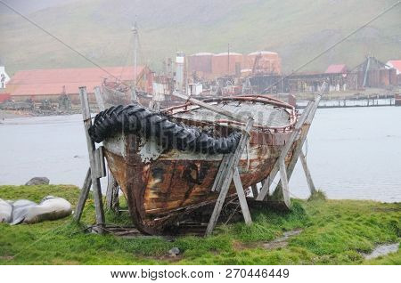 An Old Lifeboat On A Rainy Day In Grytvyken, The Capitol Of The Island Of South Georgia.