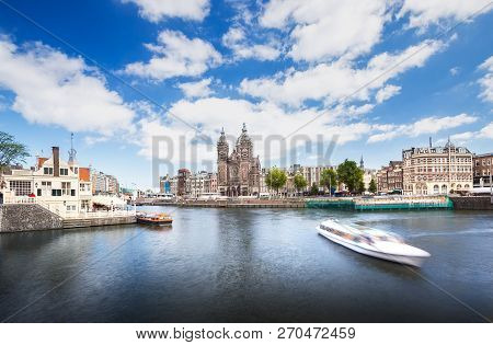 Rk Nicolaaskerk Church With Hotel And Apartment Along Canal Or River With Cruise Or Boat For Transpo