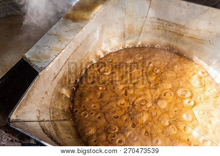 Detail Of Sugar Cane Juice Being Boiled. This Is A Part Of A Process Of Producing Panela Unrefined W
