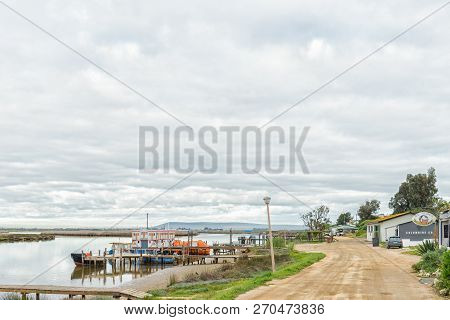 Velddrif, South Africa, August 22, 2018: A View Of Restaurants And Businesses In Bokkom Avenue Next 