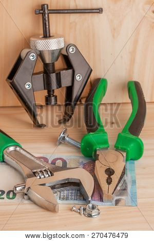 Construction Tools, The Order Of Construction Work For The Money. A Set Of Tools Wood Panel With A S