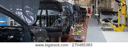 Frame Of Car Body. Long Format. Wide Angle View Of Plant Of Automotive Industry. Can Be Used As Bann