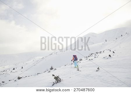 Skitouring With Amazing View Of Mountains In Beautiful Winter Powder Snow