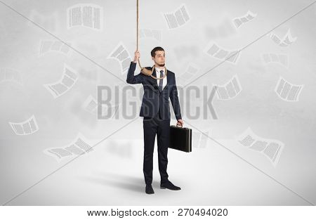 Young burnout businessman with flying documents concept