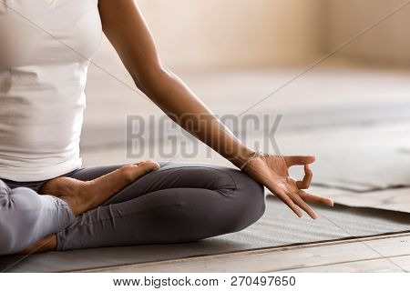 Yogi Black Woman Practicing Yoga Lesson, Doing Ardha Padmasana E