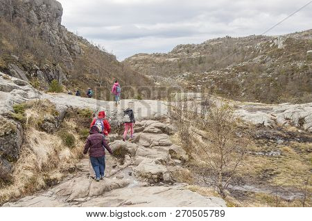 Preikestolhytta , Norway - May 13, 2017: Tourists On Trail To Preikestolen On May 13, 2017 In Preike