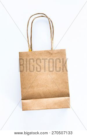 An image of a small environment friendly paper bag