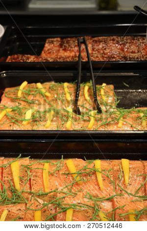 Slices Of Fresh Salmon With Herbs, Oil And Pickleweed