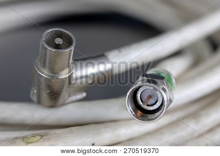 Antenna And Television Connectors On A Metal Table. Accessories For Installing Cable Television.