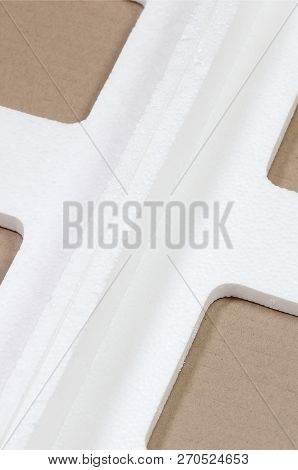 Background Image With Beige Cardboard Paper And Styrofoam Boxes Disgarded As Rubbish. The Concept Of