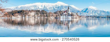 Beautiful View Of Famous Bled Island (blejski Otok) At Scenic Lake Bled With Bled Castle (blejski Gr