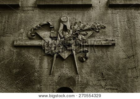 Grunge Freemasonry Emblem On A Dramatic Background - Masonic Triangle And Compass, Closeup Of Old Ar
