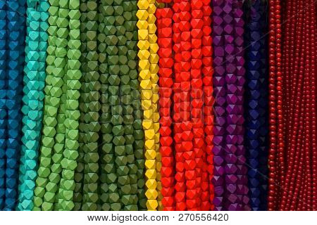 Colorful Beads Background. Background Pattern Of Multicolored Natural Stone Beads. String Of Beads I