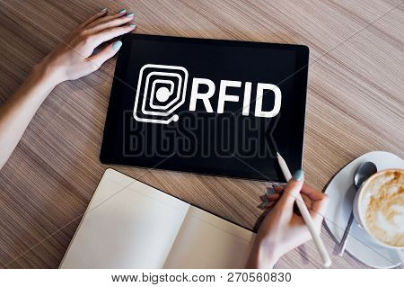 Rfid Radio Frequency Identification Technology Concept On Device Screen. Security And Automation.