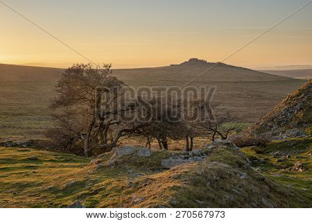 Beautiful Landscape Sunset Image Over Abandoned Foggintor Quarry In Dartmoor With Raking Soft Sunlig