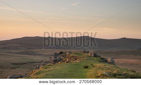 Beautiful Landscape Sunset Image Over Abandoned Foggintor Quarry In Dartmoor With Raking Soft Sunlig