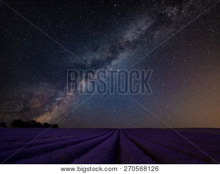 Stunning Vibrant Milky Way Composite Image Over Landscape Of Beautiful Lavender Field