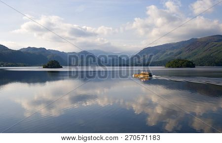 Derwent Water Towards Borrowdale Valley With Launch/boat, Lake District, Cumbria, England
