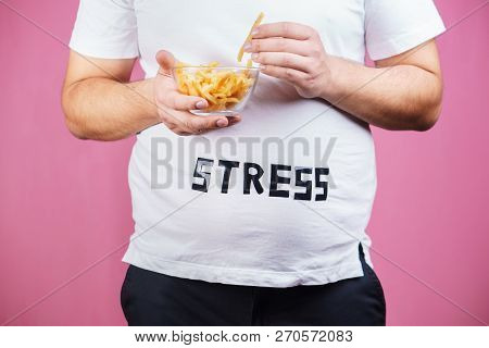 Stress, Eating Problems, Compulsive Overeating, Fat Food, Weight Gain. Overweight Man With Appetizin