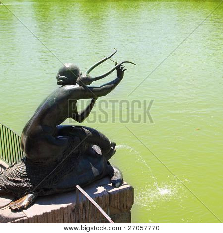 Madrid Sirena con Lira statue of mermaid in Retiro park lake