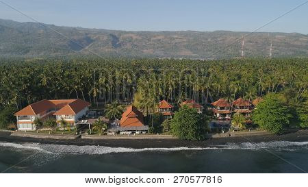Aerial Seascape Luxury Hotel On Beach Background Mountainss In Tropical Resort. Bali, Indonesia, Tra