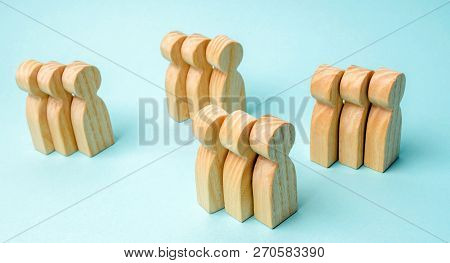 Groups Of Wooden People. The Concept Of Market Segmentation. Marketing Segmentation, Target Audience