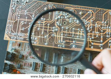 Micro Or Nano Electronic Board Reapir Concept, Hand Hold Magnifying Glass
