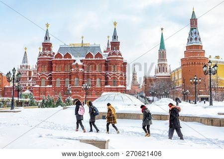 Moscow, Russia - February 5, 2018: People Visit The Manezhnaya Square Near Moscow Kremlin In Winter.