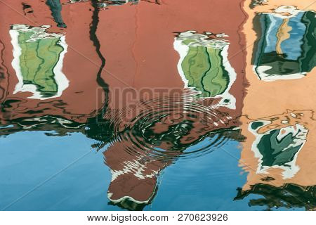 Reflection Of Colourful Houses On The Island Of Burano
