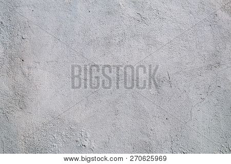 Texture Of Old Gray Cracked Concrete Wall Of Building For Background