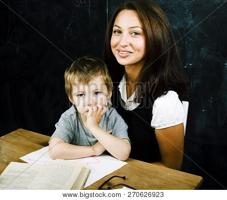 Little Cute Boy Pupil With Young Real Teacher, Classroom Studyin