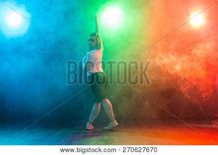 Hip-hop, Jazz-funk, Tecktonik, Waacking, Trance And Street Dances Concept - Young Woman Dancing Jazz