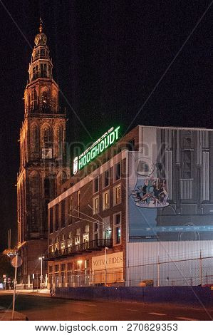 Groningen, October 10 2018. Night Shot Of The Vindicat Fraternaty Building, With The Martini Tower I