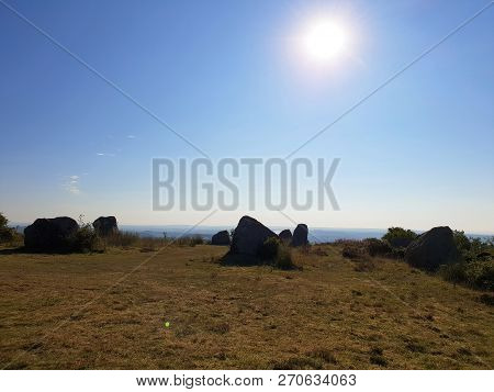 Old Stone Circle On Top Of St. Austell Beacon On A No Cloud Summers Day.