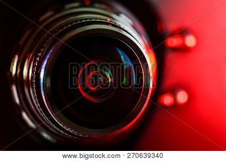 Camera Lens And Red Backlight . Horizontal Photography