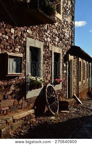 Horse Carriage Whell On The Street In Castrillo De Los Polvazares. Architecture, History, Camino De 