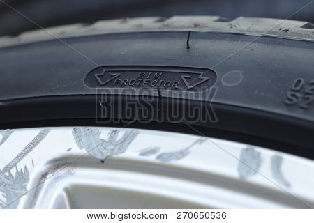 Close Up View On The Rim Protection Feature At The Sidewall Of A High Perfomance Car Tire Mounted On
