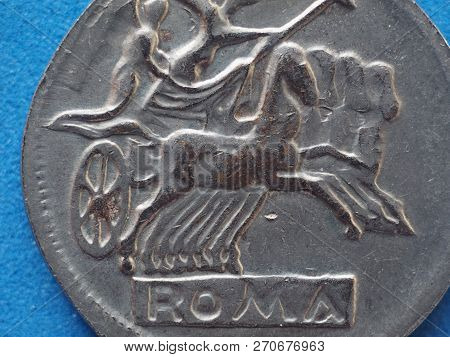 Ancient Roman Coin With Horses And Biga (chariot)