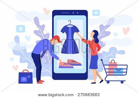 Mobile Shopping Consept. A Man And A Woman Buy Things In The Online Store. Shopping On Social Networ