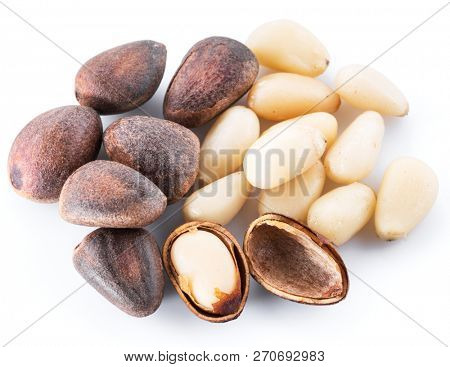 Pine or cedar nuts on the white background. Organic food.