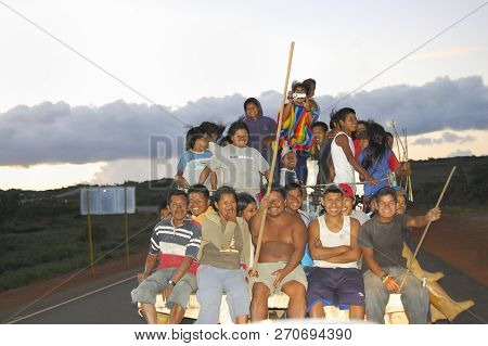 Ciudad Bolivar, Venezuela - May 12, 2009: Happy Locals Riding On The Street In The Back Of A Pickup 