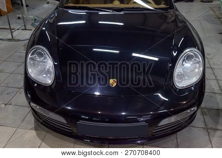 Novosibirsk, Russia - 08.01.2018: Black Porsche Boxster S 2006 Release Front View On The Car Parking
