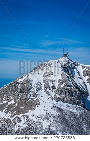 Stunning Mountain Winter Landscape Panorama Of Stirovnik Peak, The Highest Summit Of The Lovcen Nati