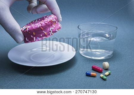 Various Medicines To Combat Diabetes Along With A Sweet Cake, Concept Of Disease Of Hyperglycemia Or